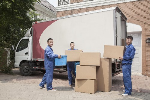 Sudbury Storage staff sorting recyclable packing materials for reuse and recovery