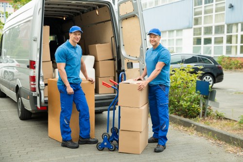 Packed boxes and labelled belongings ready for a flat removal in Sudbury